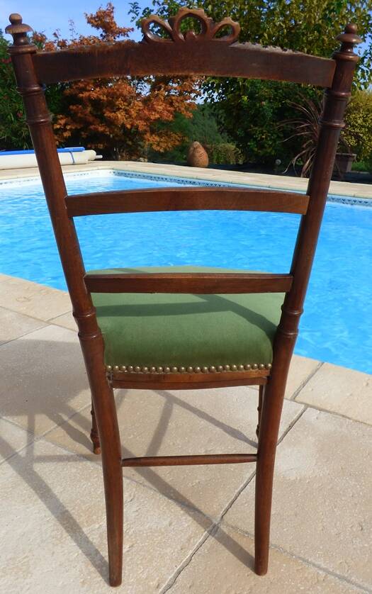 1 solid wood chair with green velvet top and nails