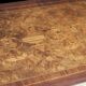 Superb Napoleon III table. Marquetry top and gilded bronzes.