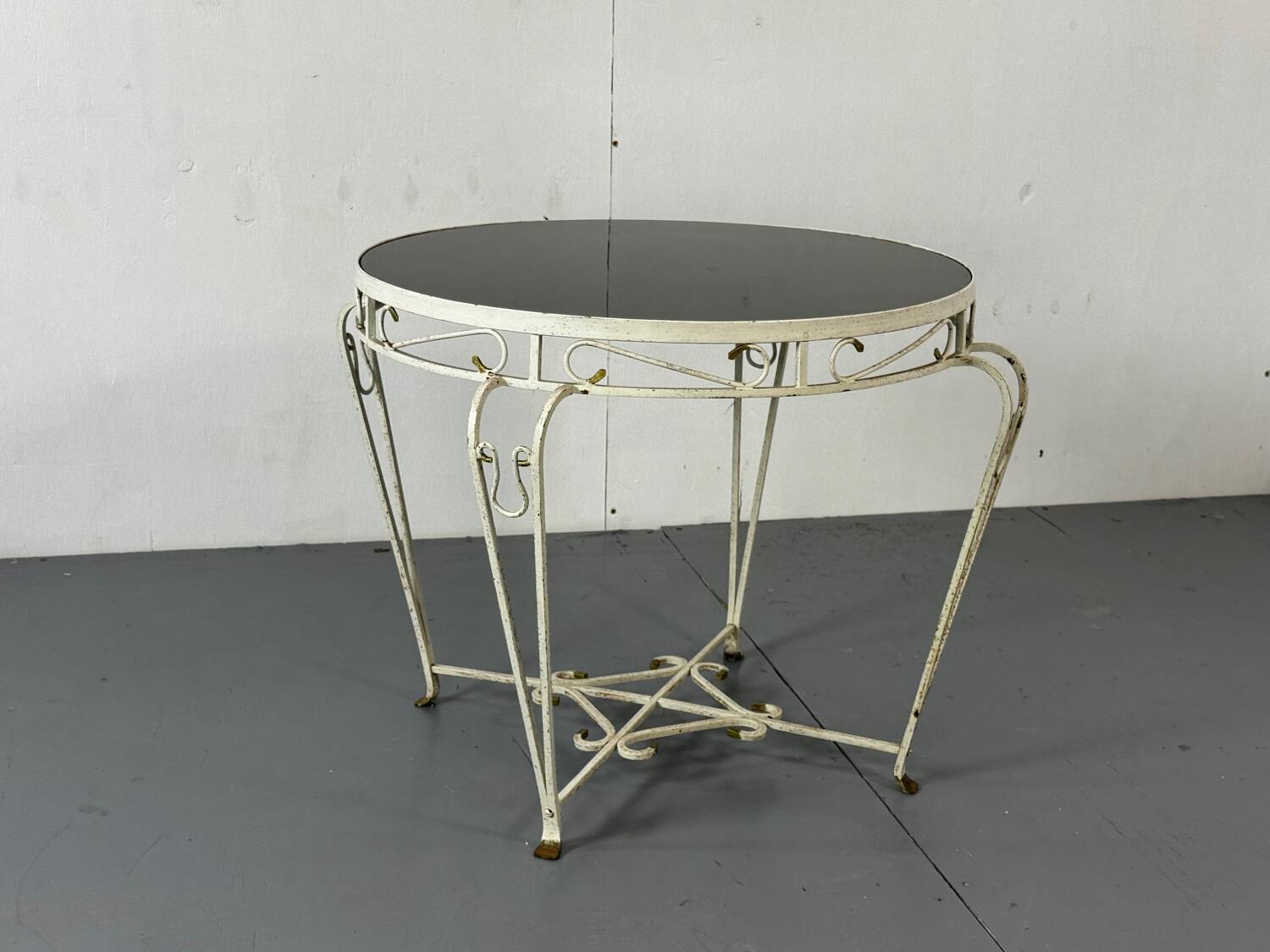 Side table in iron and glass in French Regency style, 1950s.