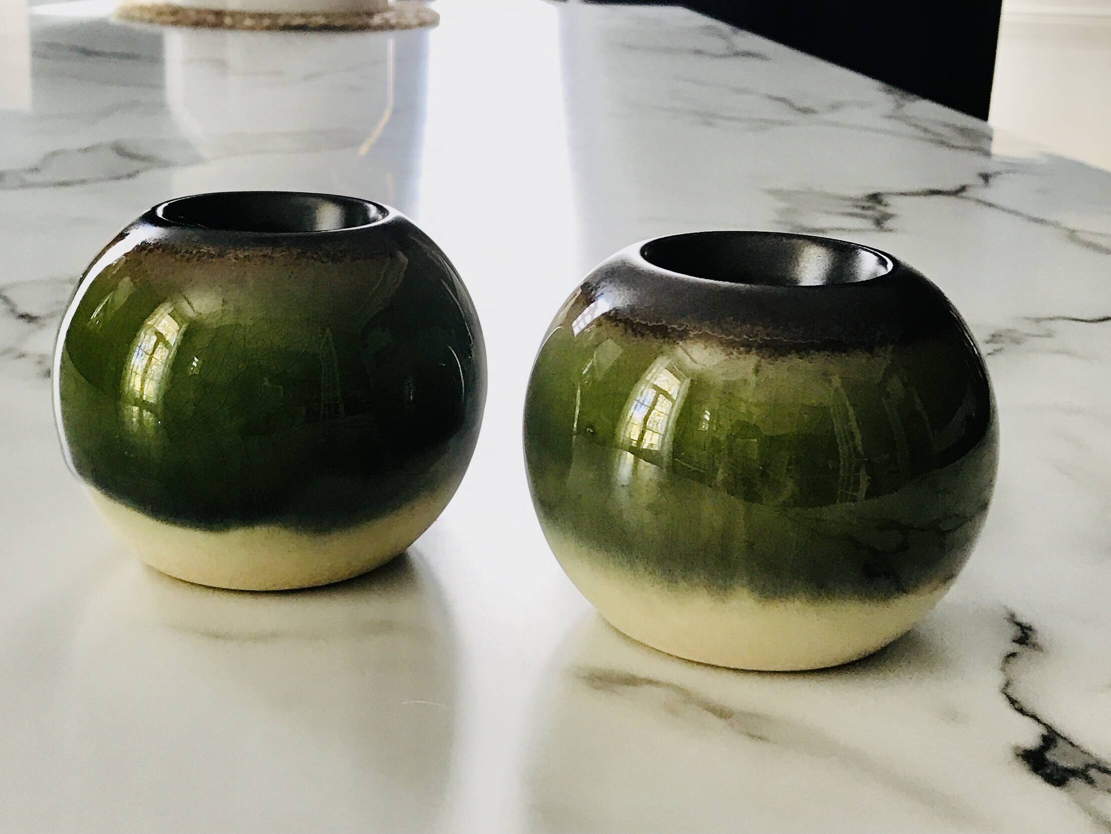 Pair of ceramic ball candlesticks