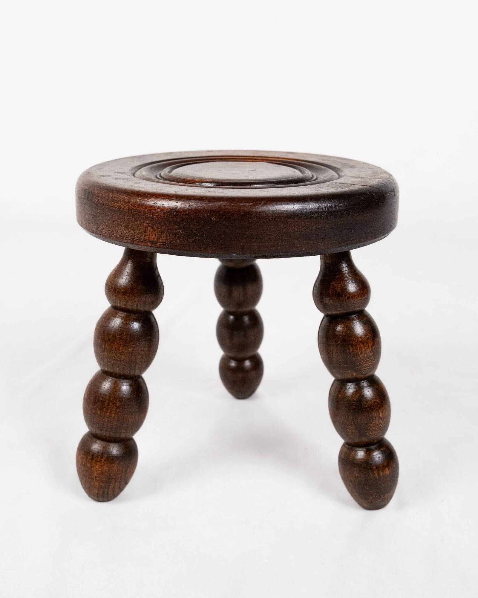 Low chair and turned wooden stool, Dudouyt style, France, 1940s