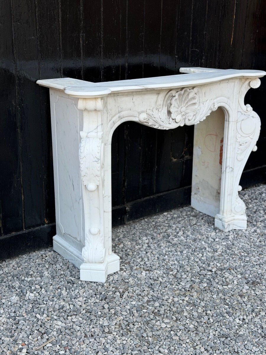 Louis XV style fireplace in Carrara marble, circa 1980.