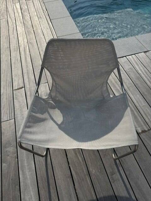 Outdoor Paulistano Armchair by Objekto, designed by Paulo Mendes da Rocha.