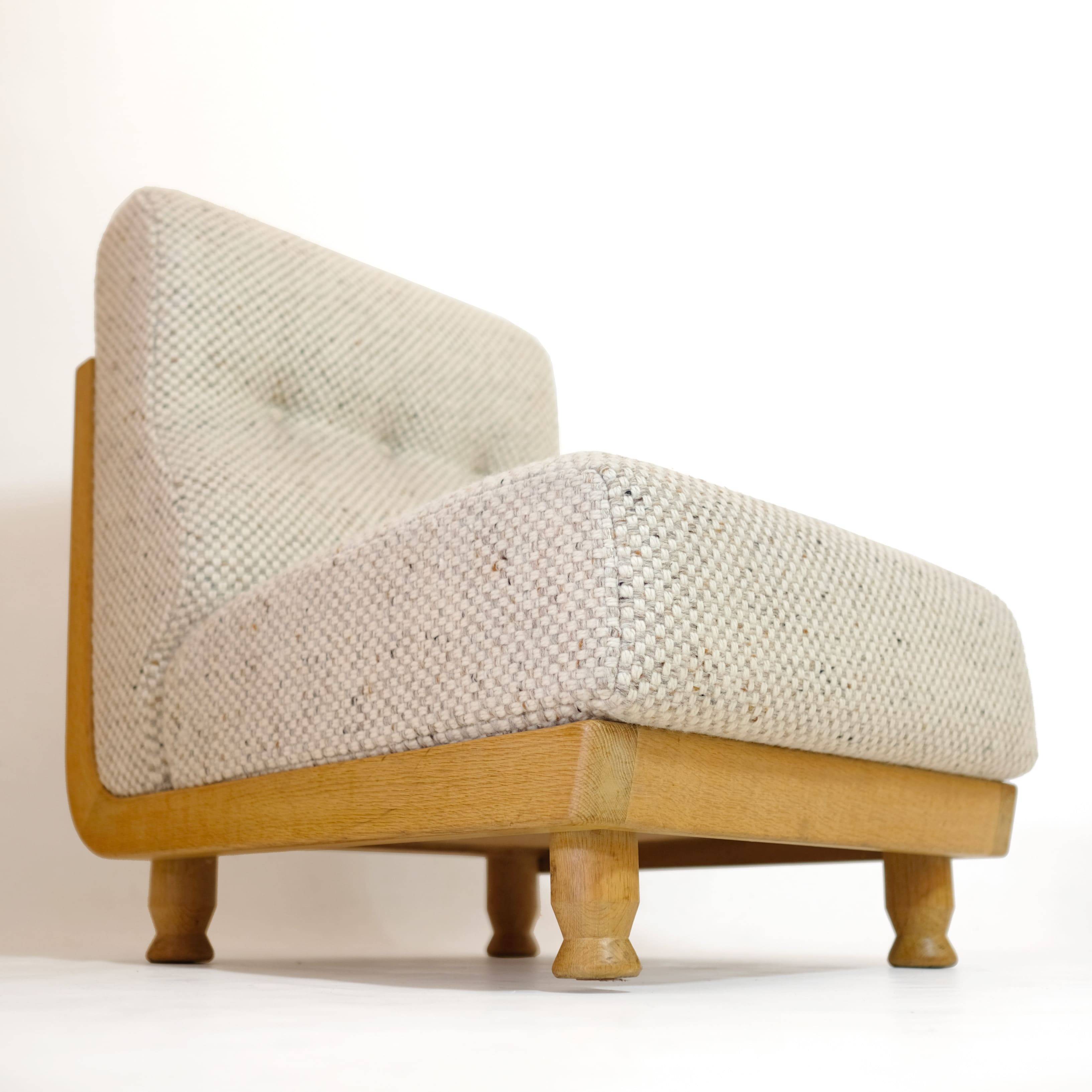 Robert Guillerme & Jacques Chambron, armchair upholstered in beige fabric.