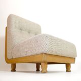 Robert Guillerme & Jacques Chambron, armchair upholstered in beige fabric.