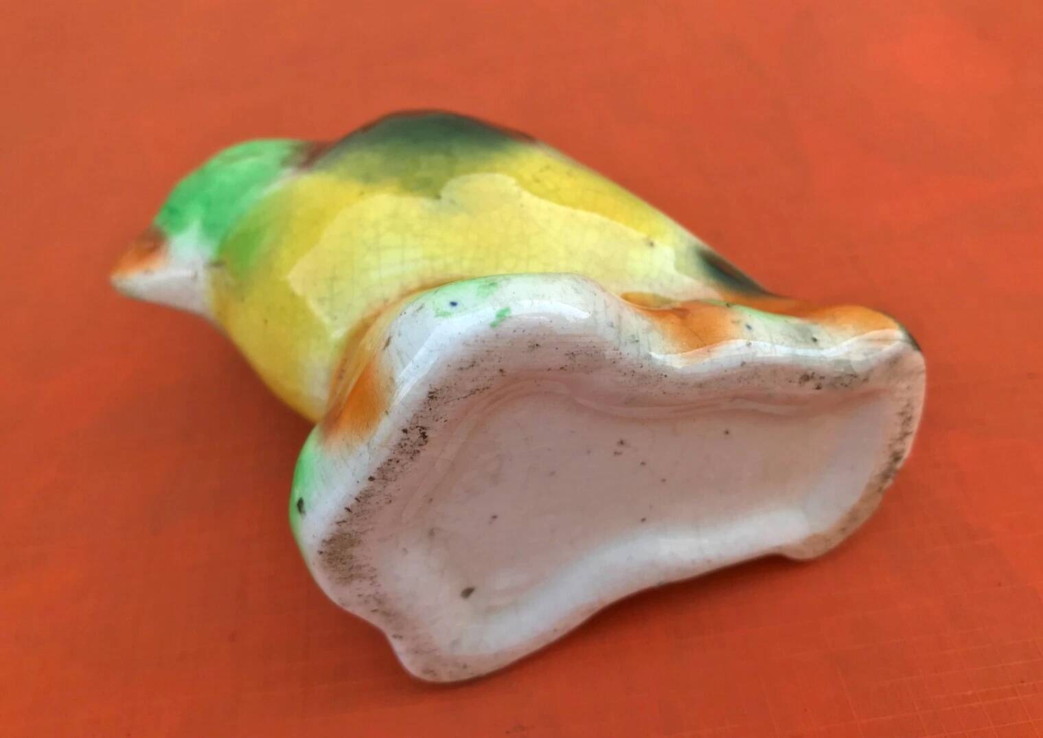 Polychrome ceramic parrot shape