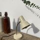 Vintage articulated industrial beige metal desk lamp