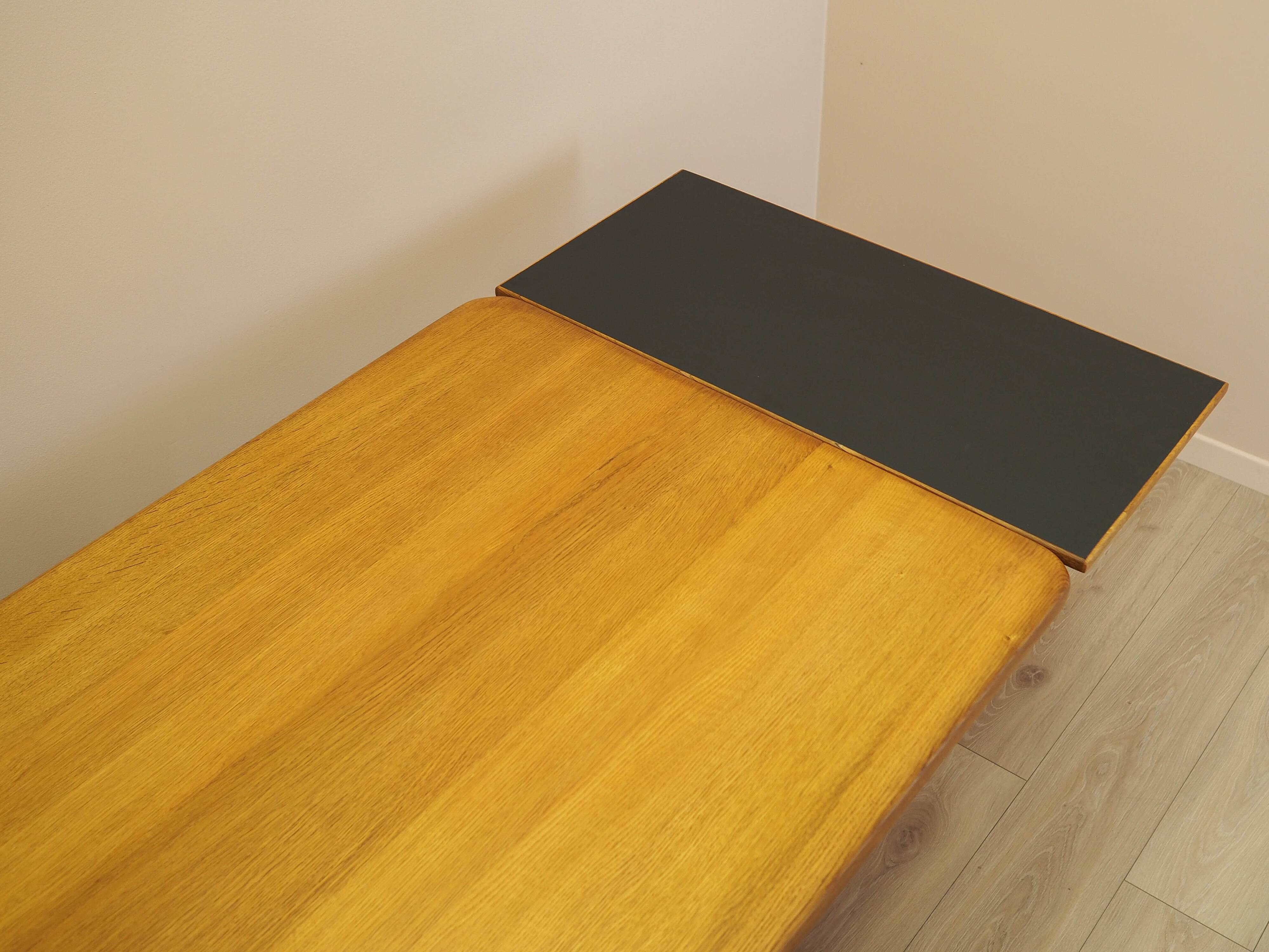 Solid oak dining table by Henning Kjærnulf, Denmark, 1960s
