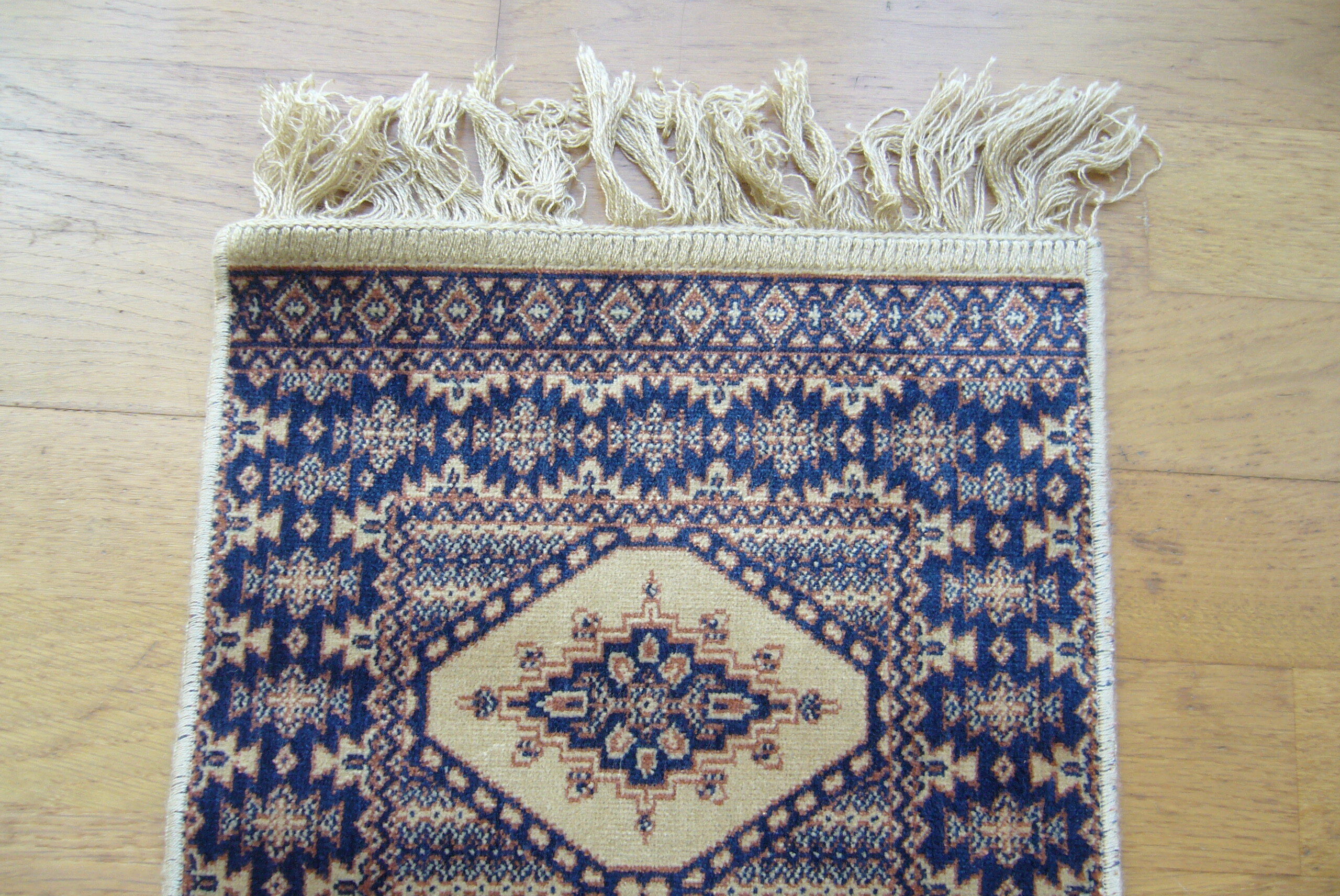 Three oriental rugs 35 x 70 cm