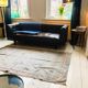 Chesterfield-style brown leather canape