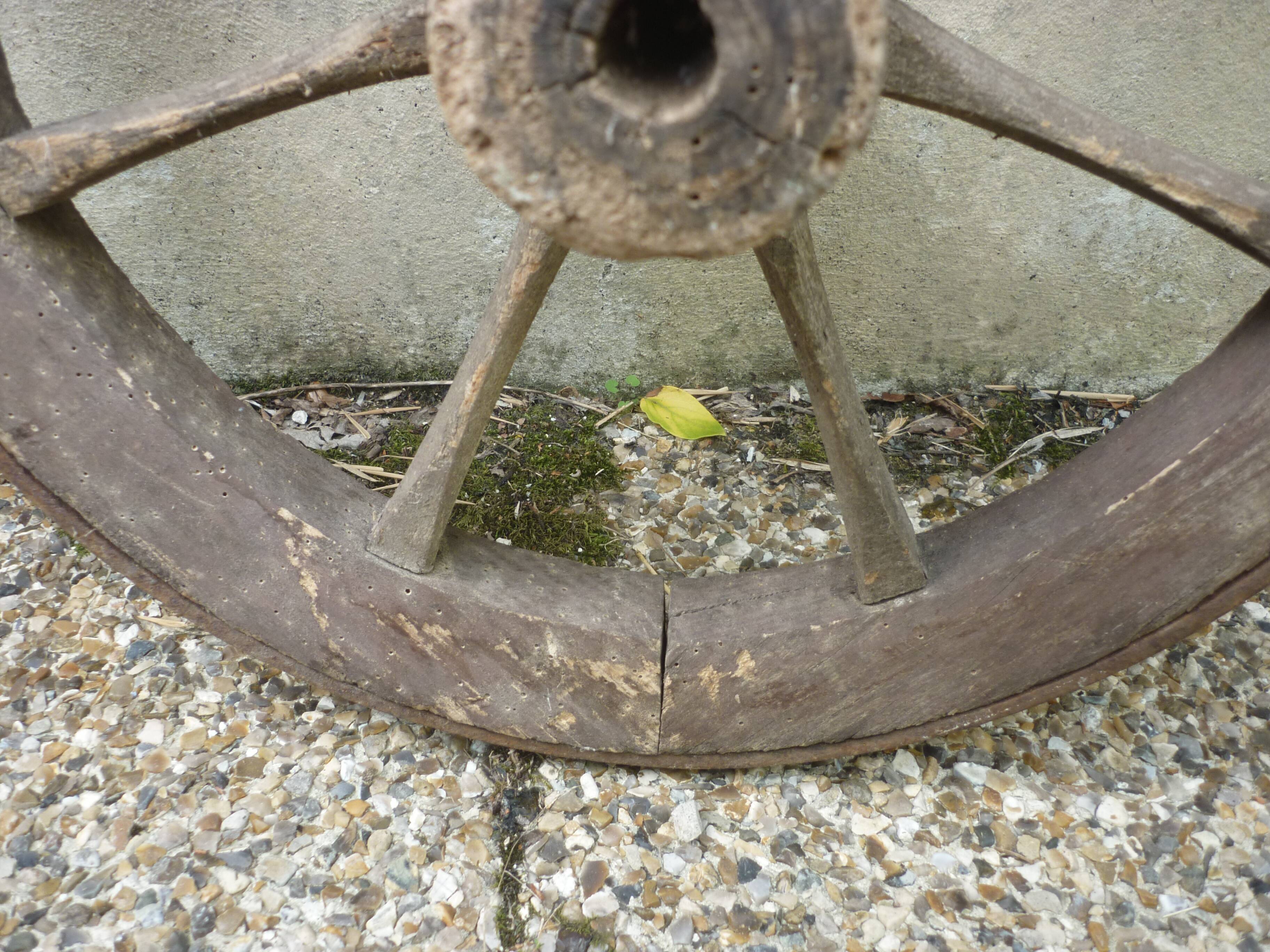 Old wooden cart wheel