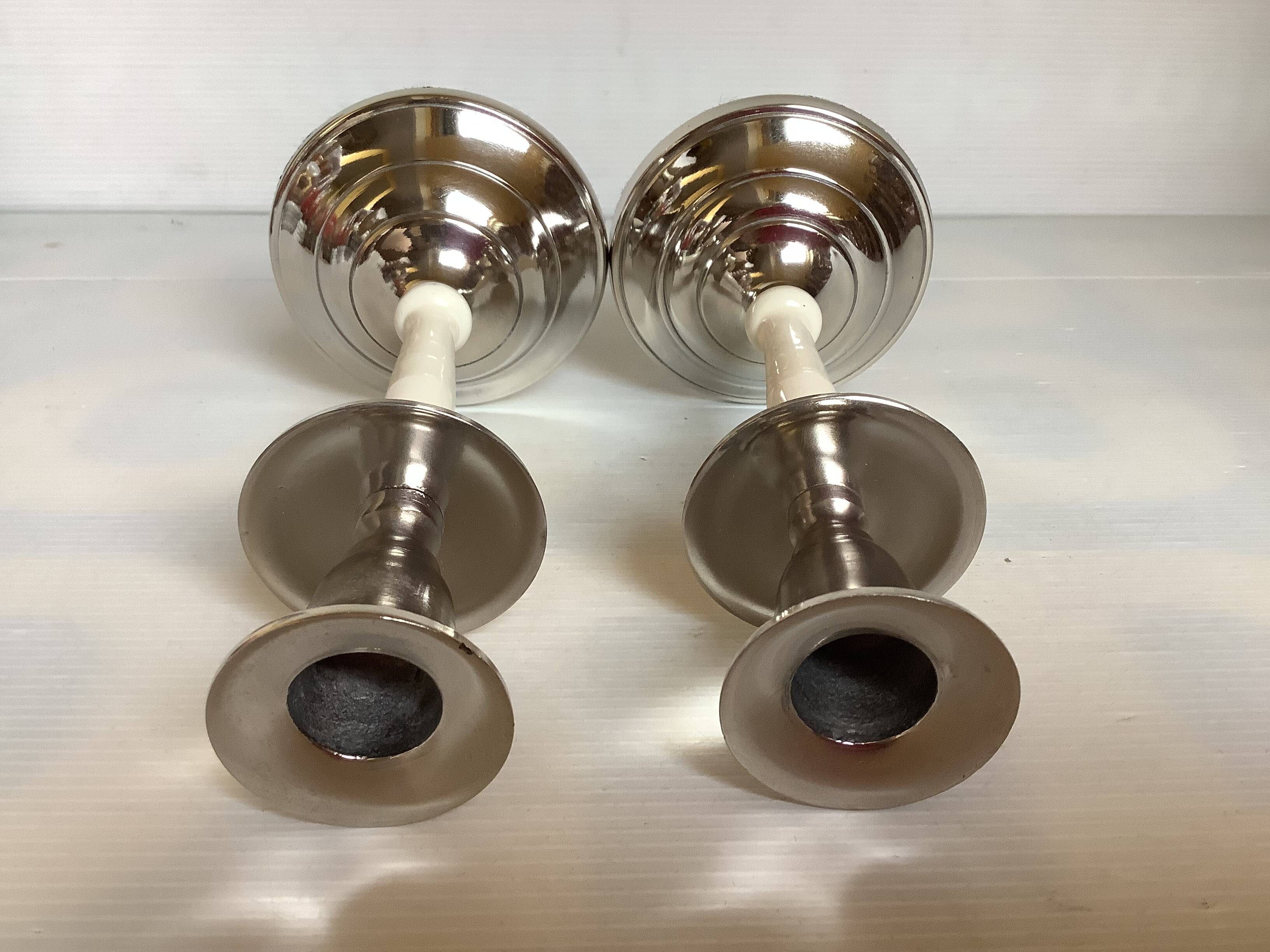 Pair of silver metal candlesticks