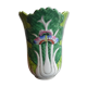 Ancient Asian ceramic vase green and white background decorated with butterflies