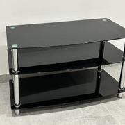 Modern chest of drawers with stainless steel and smoked glass