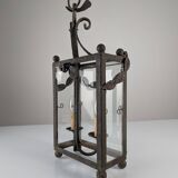 Wrought iron lantern with glass panels, leaf motifs