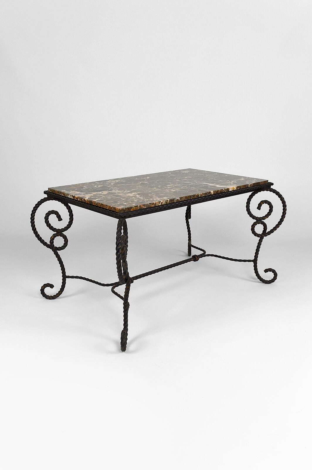 Coffee table in patinated wrought iron and marble, circa 1940