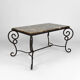 Table basse en fer forgé patiné et marbre, circa 1940