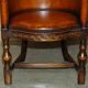 Fauteuil de bureau Édouardien 1910 en cuir et chêne sculpté