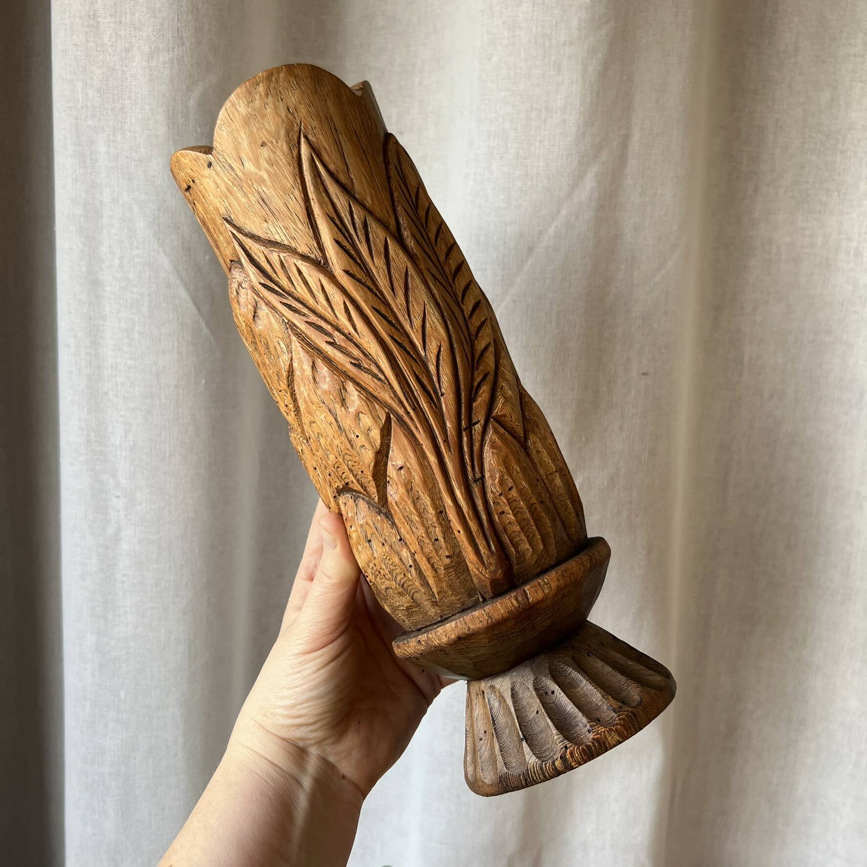 Large sculpted vase made of solid wood