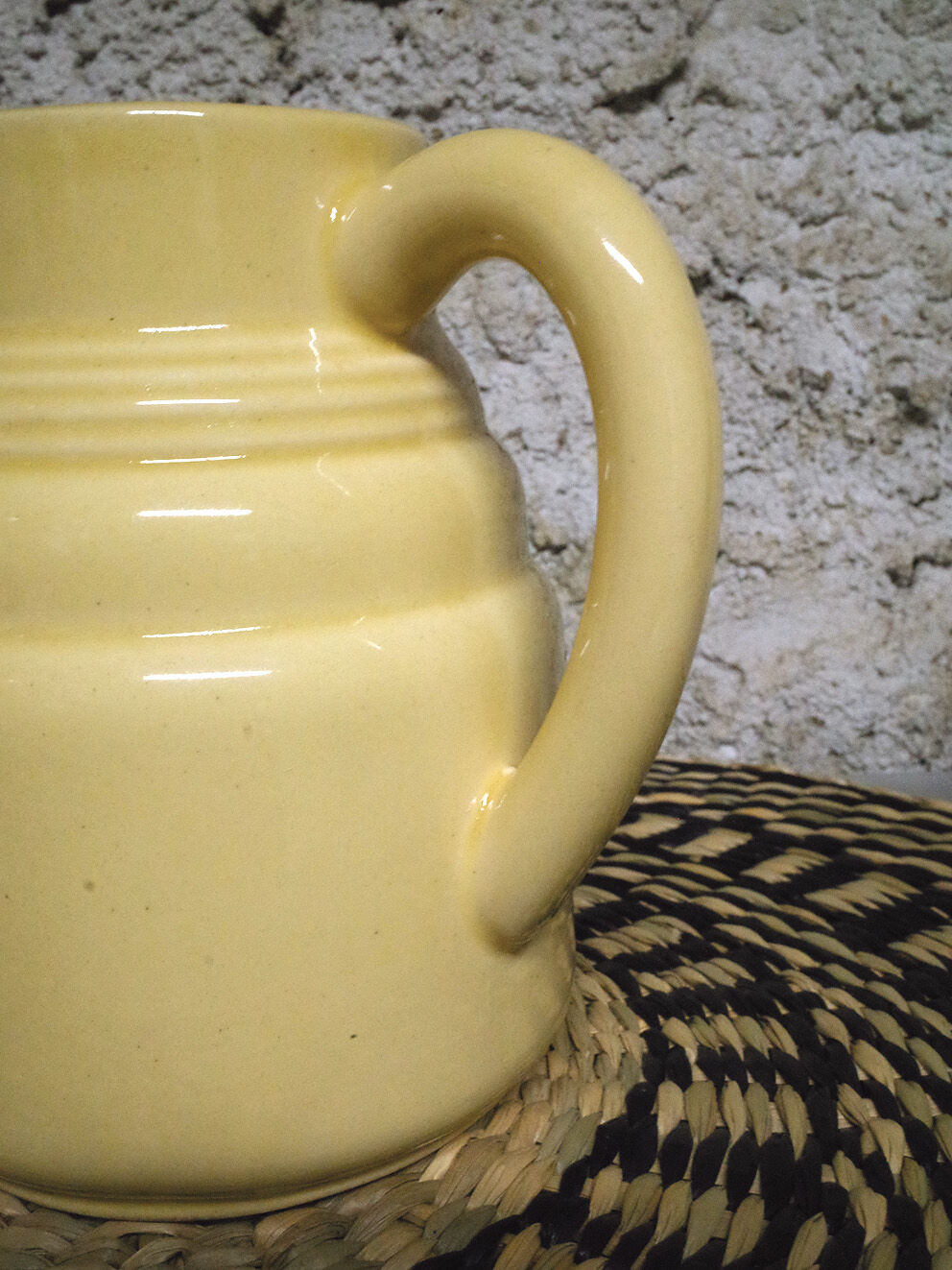 Pastel yellow ceramic pitcher