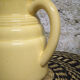 Pastel yellow ceramic pitcher