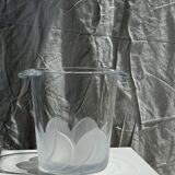Glass ice or champagne bucket with stylized petal patterns