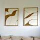 Diptych relief panels in cream and camel brown.