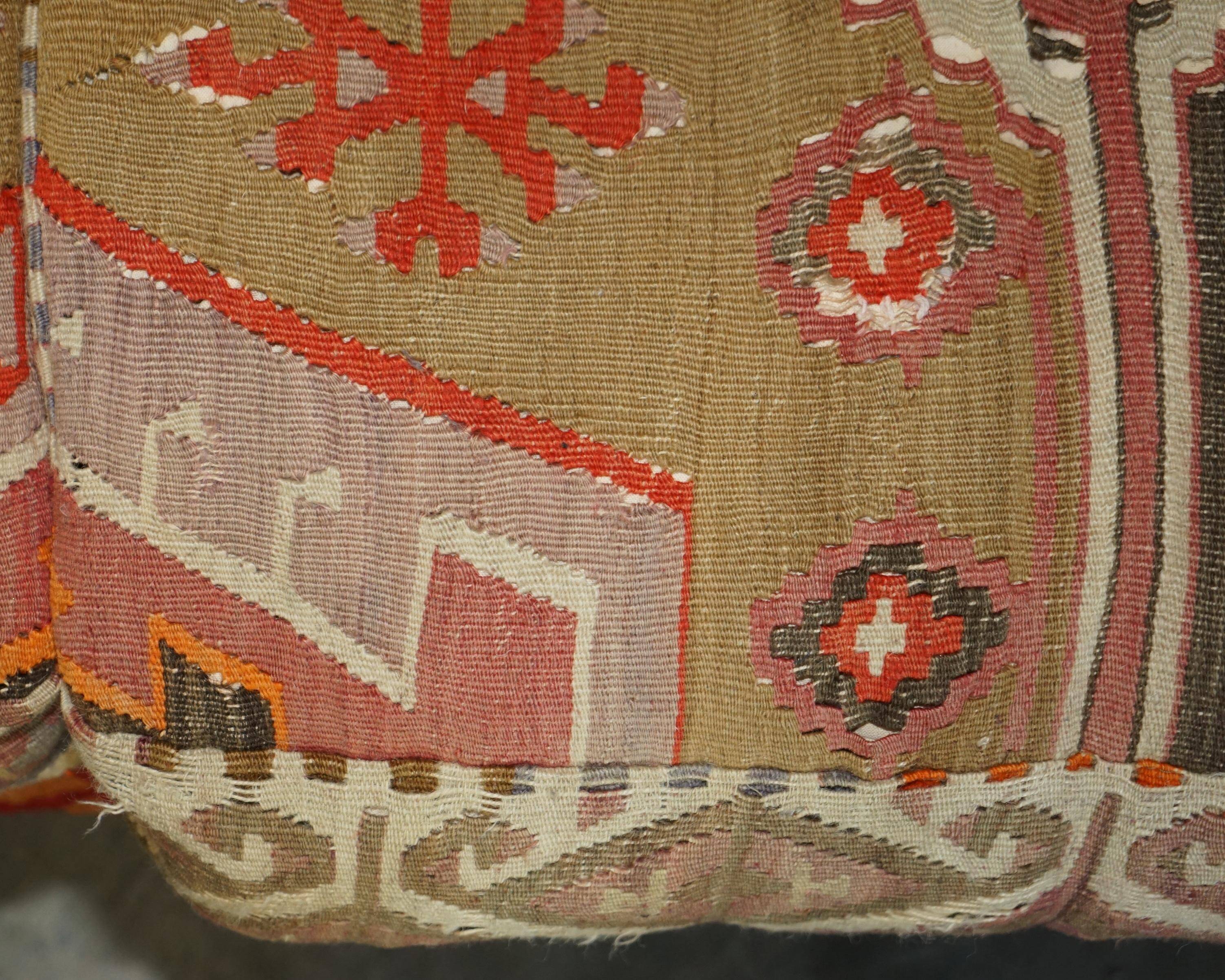 Vintage three-seater canapé by George Smith upholstered in Kilim with feather cushions.