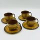 Set of four vintage Boch Palma cups and saucers.