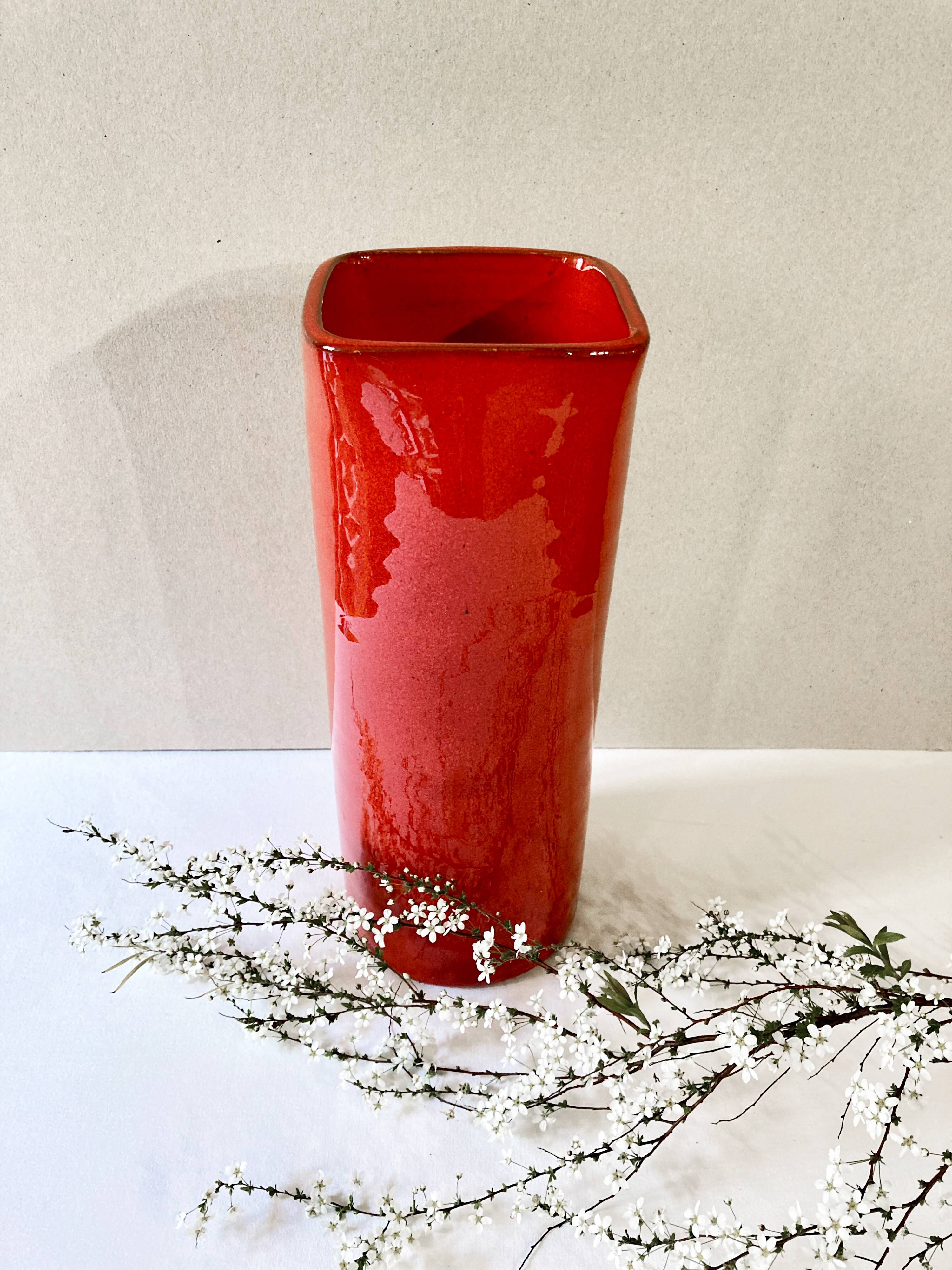 Large red glazed ceramic vase