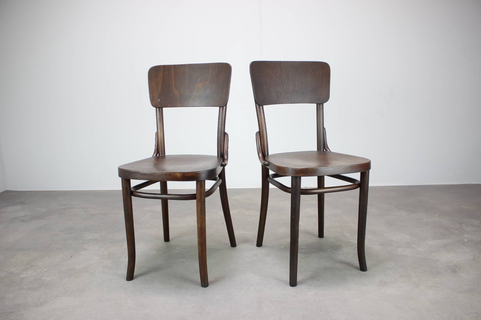 Pair of antique armchairs Model No B28 by Thonet, bent wood and caning, Austria 1920s.