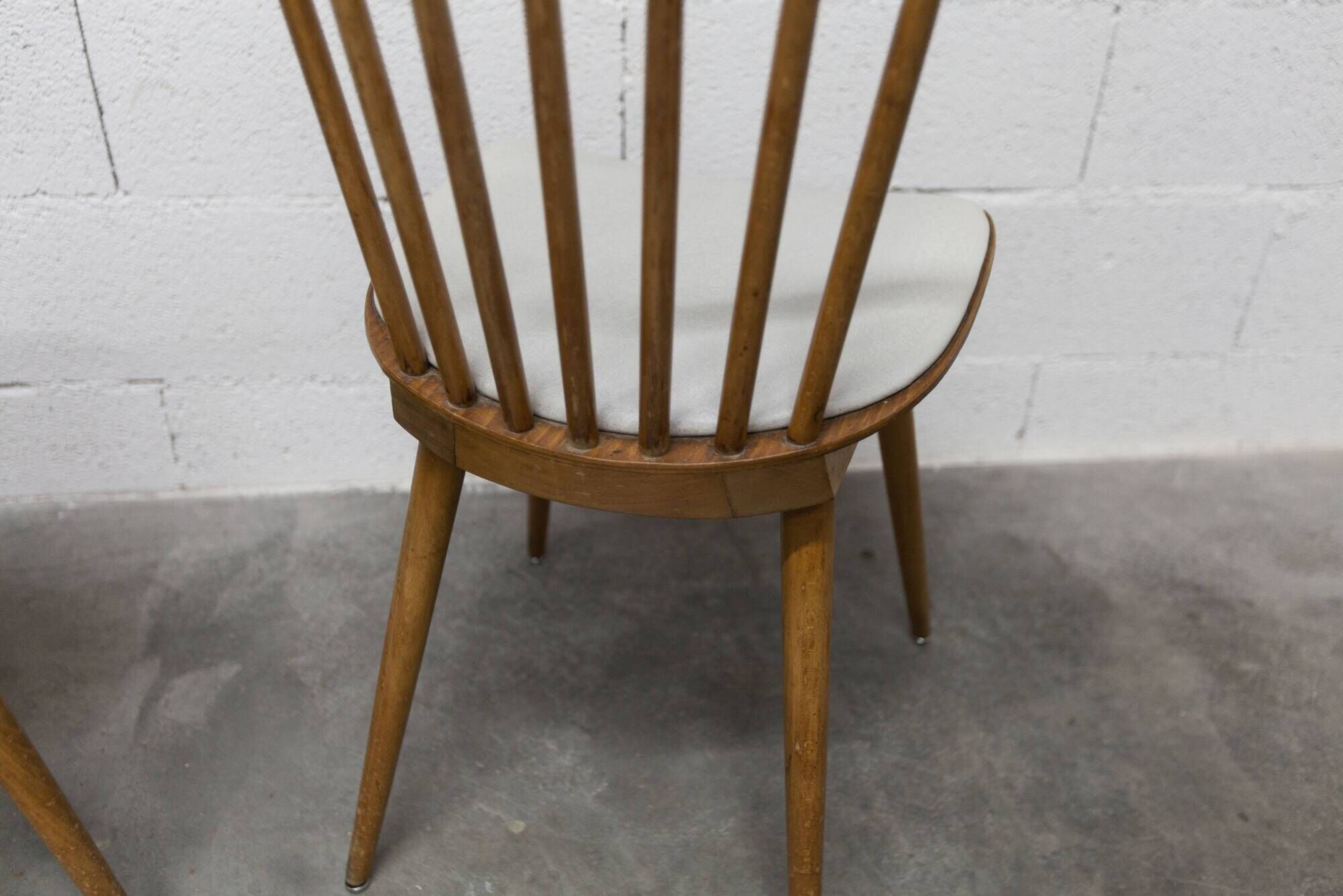 Pair of Baumann Menuet chairs, Honey patina, White skai seat
