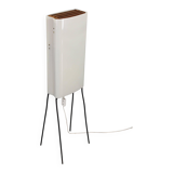 Mid-century modern floor lamp on iron legs with plastic shade and wood accent