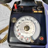Telephone in black bakelite dial with call system