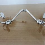 Pair of chrome metal coat hooks from the 1970s.