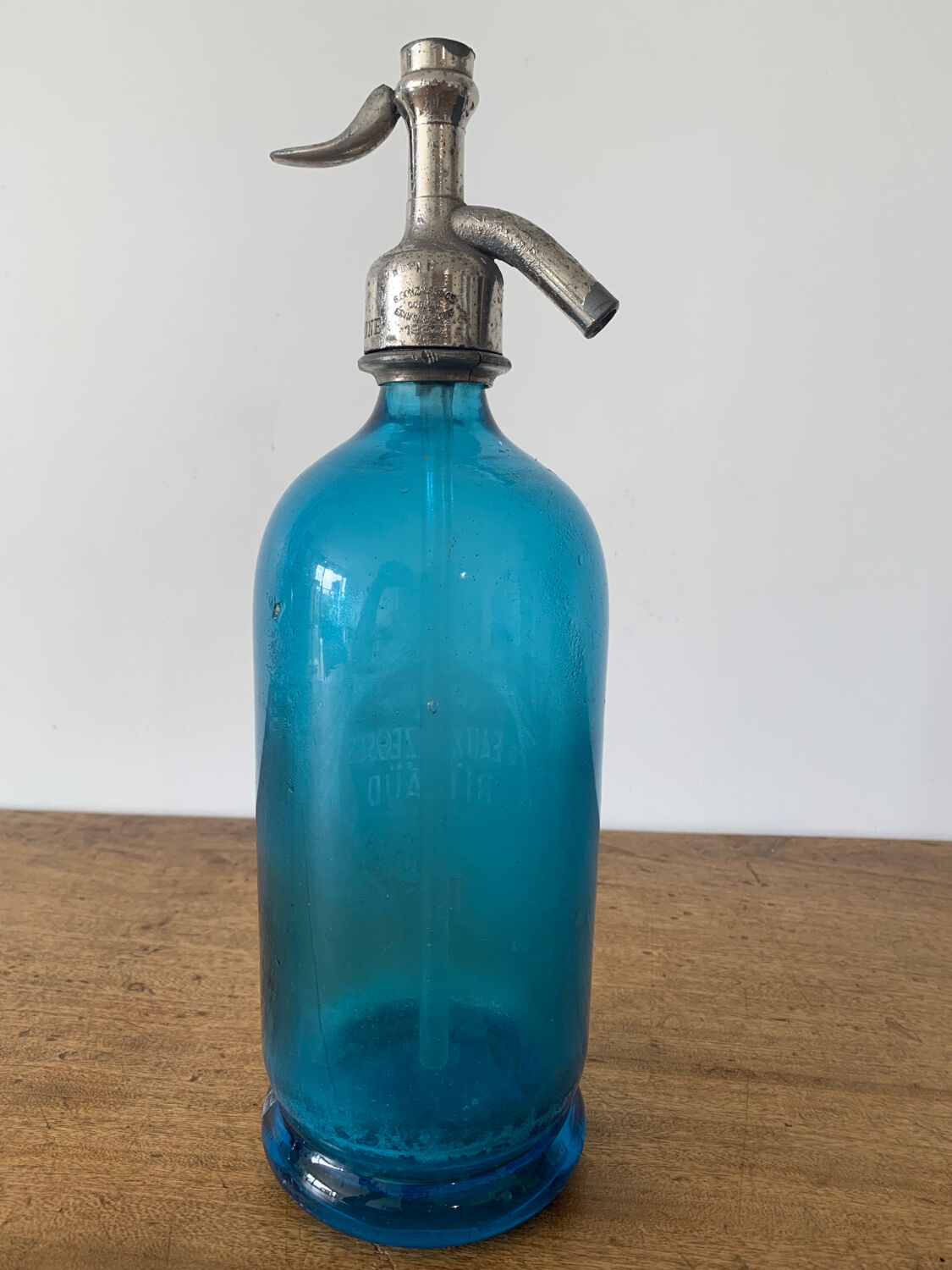 Old bottle of sparkling water