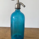 Old bottle of sparkling water