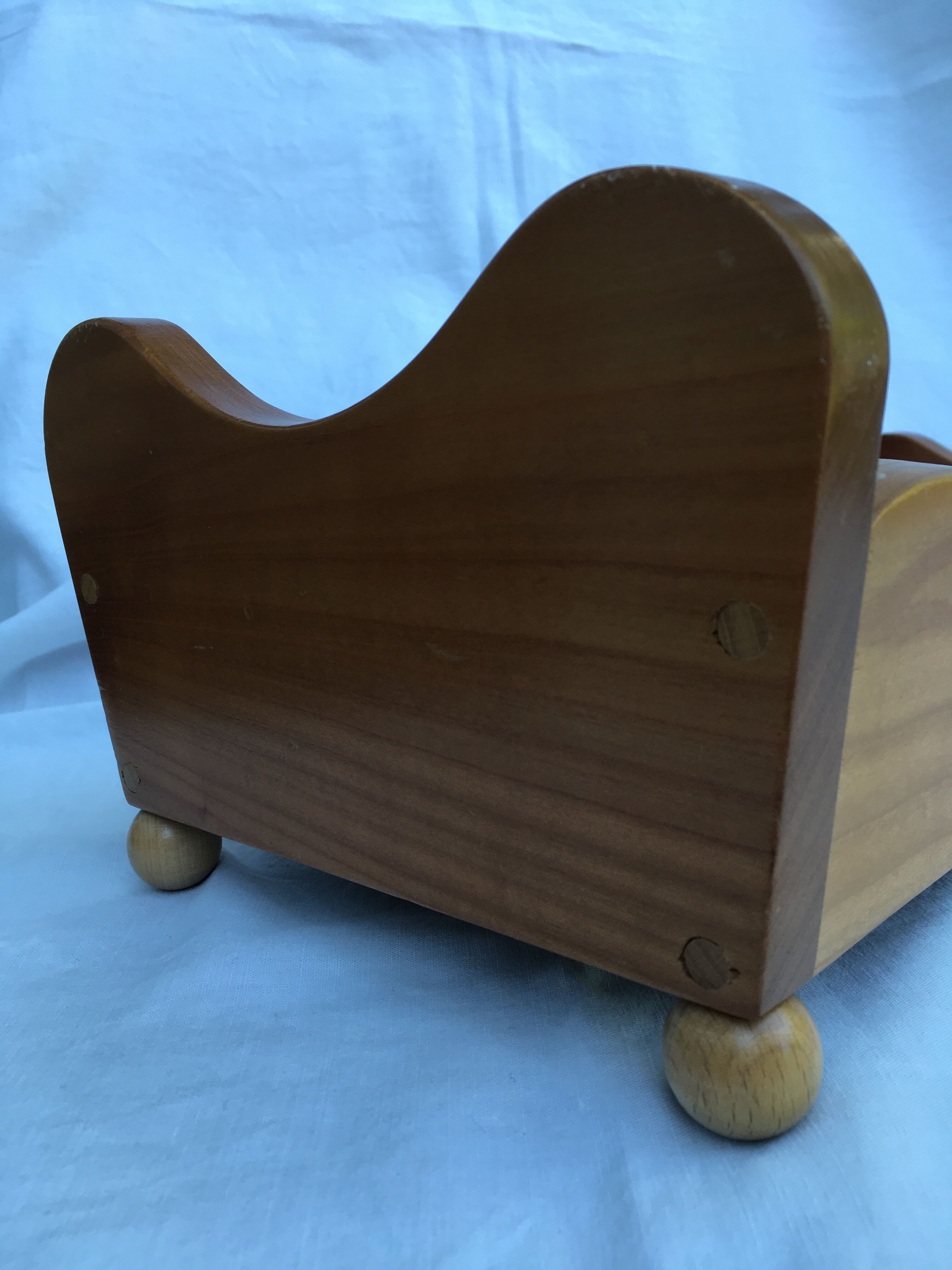 Wooden doll bed