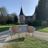 Pair of wicker "basket" armchairs