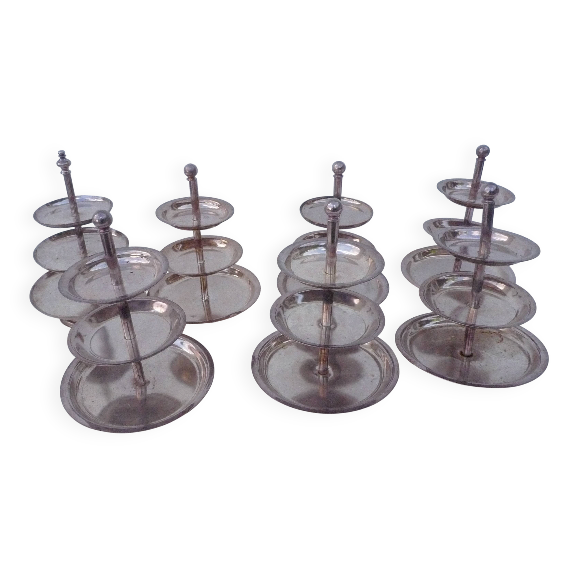 Set of 10 three-tiered serving trays.