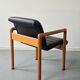 Pair of vintage Flototto armchairs in leather and wood, 1980s.