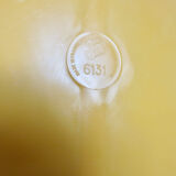 Round wall mounted mirror in yellow plastic 1970