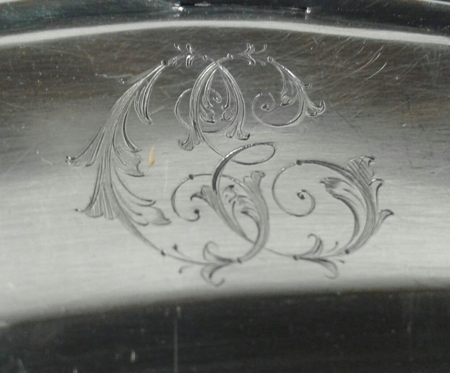 Flat oval silver metal Boulenger