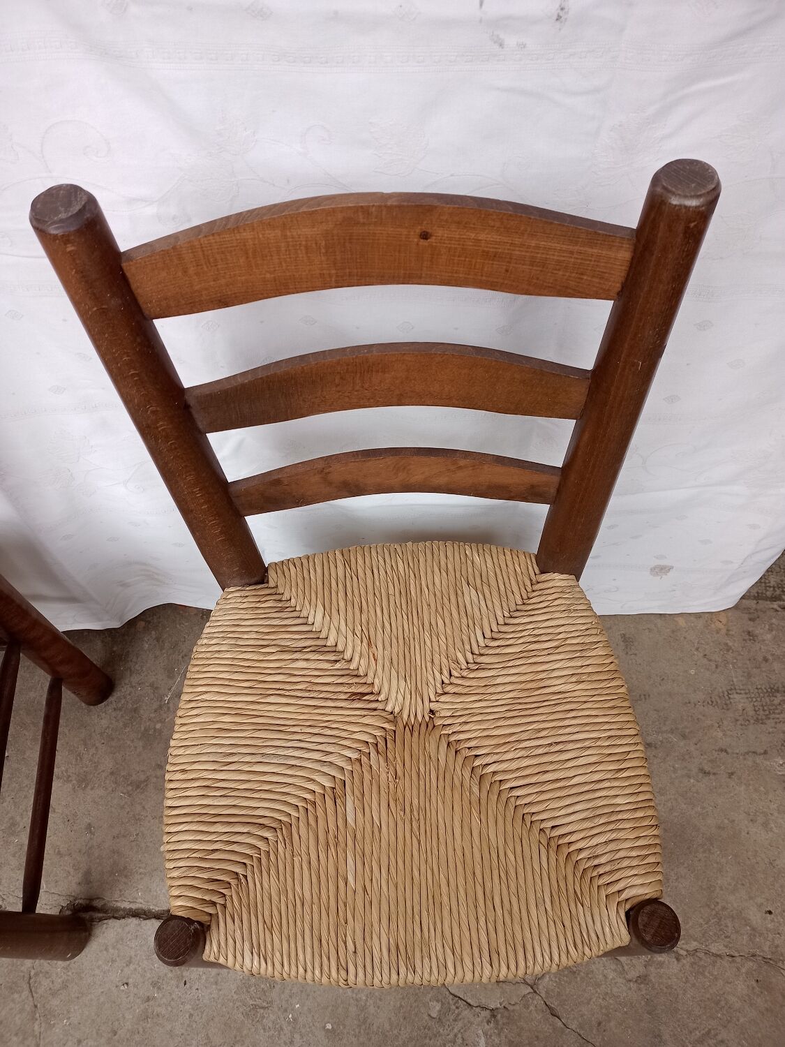 Brutalist chairs in walnut and straw