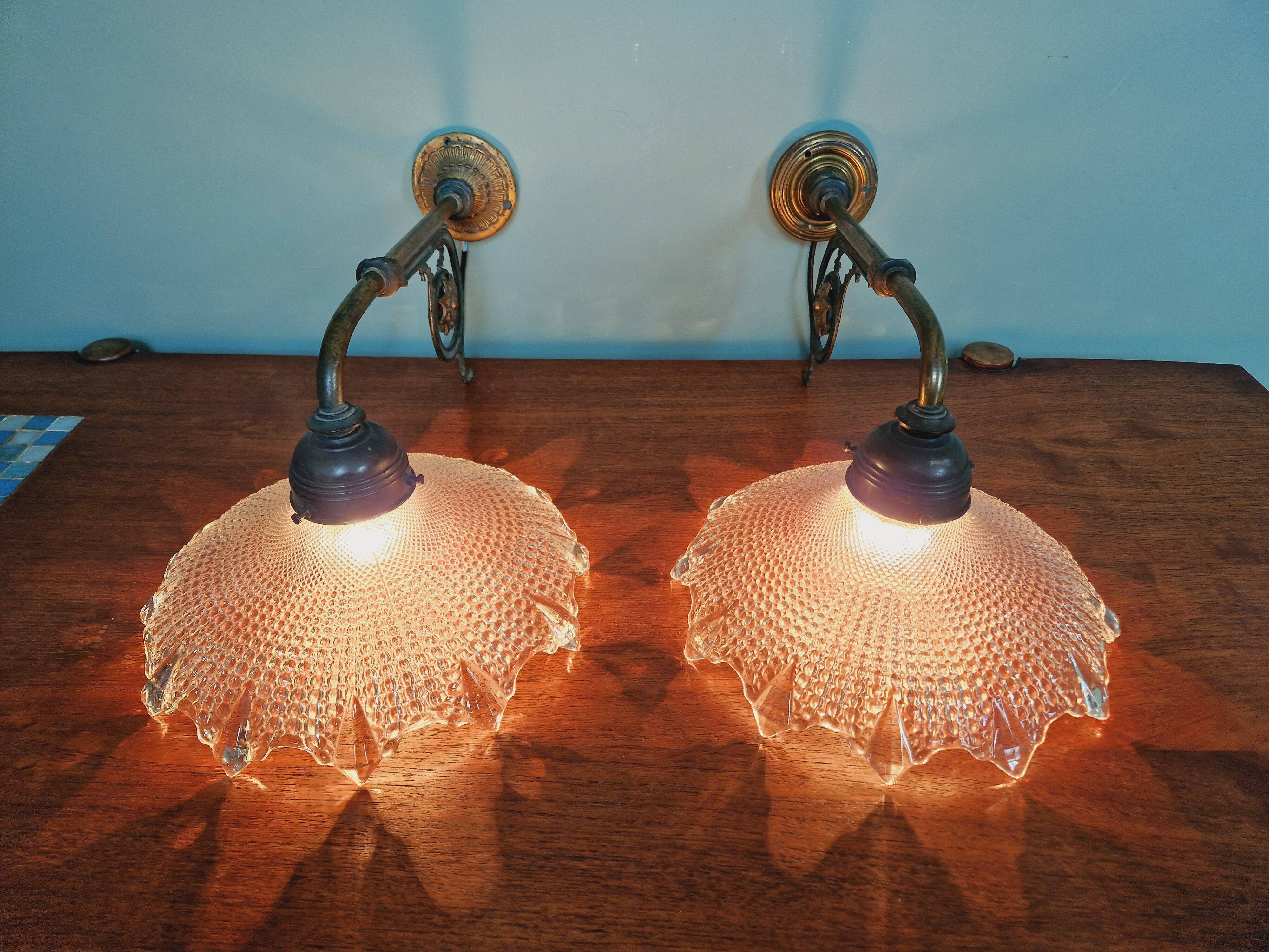 Pair of pendant lights in bronze and scalloped transparent glass