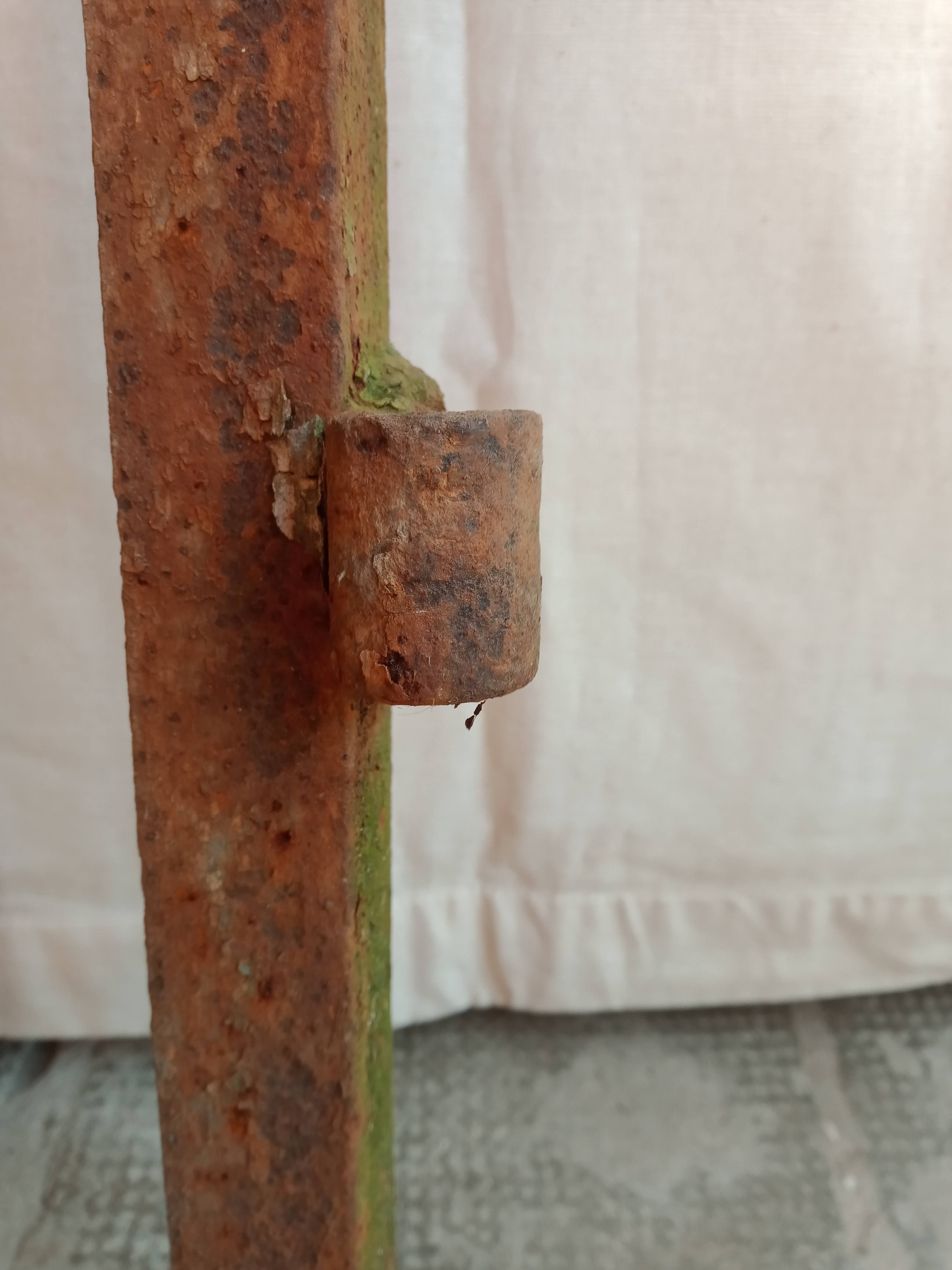 Old riveted metal gate