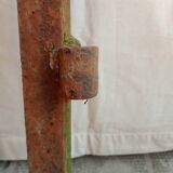 Old riveted metal gate