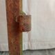 Old riveted metal gate