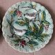 Duo of plates in barbotine decorated with two birds on a fruit tree