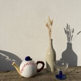 Teapot in white ceramic baseball